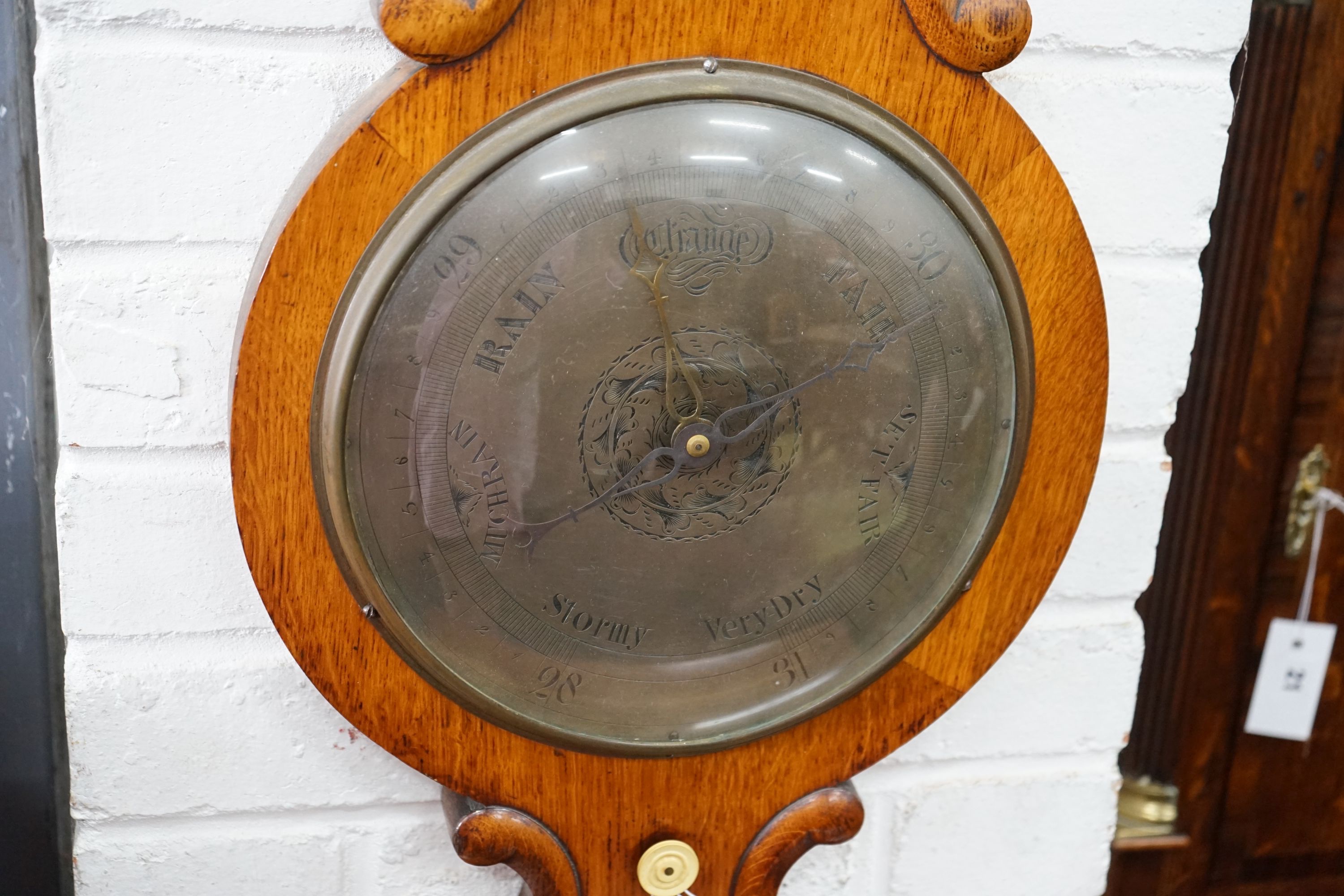 A George III mahogany banded 8 day longcase clock marked JA Farnham, Lyme Regis, height 210cm